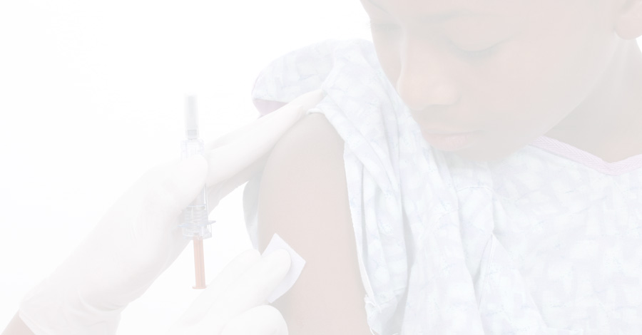 Boy in hospital receiving injection